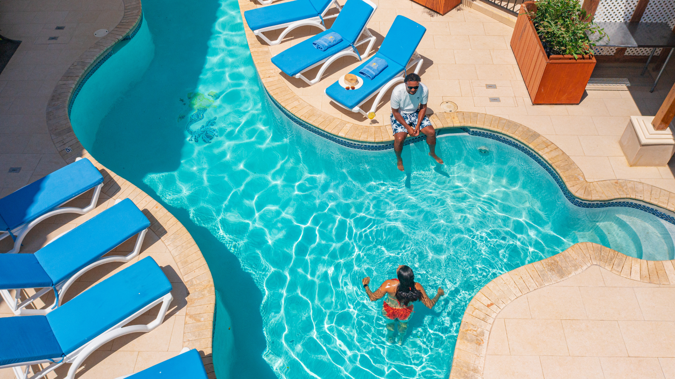 Unwind in Paradise: Stay 5, Pay 3 at SunBreeze Suites on Ambergris Caye